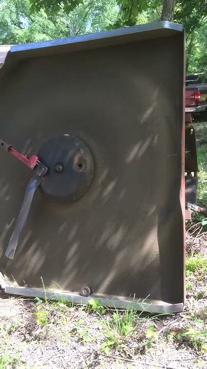 how to remove bush hog blades
